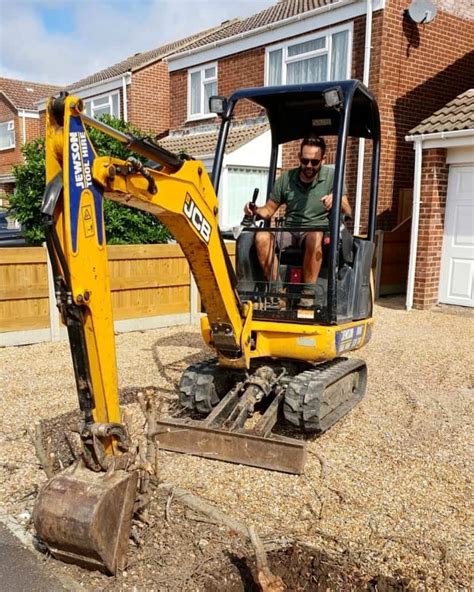 mini digger through house|micro digger back garden.